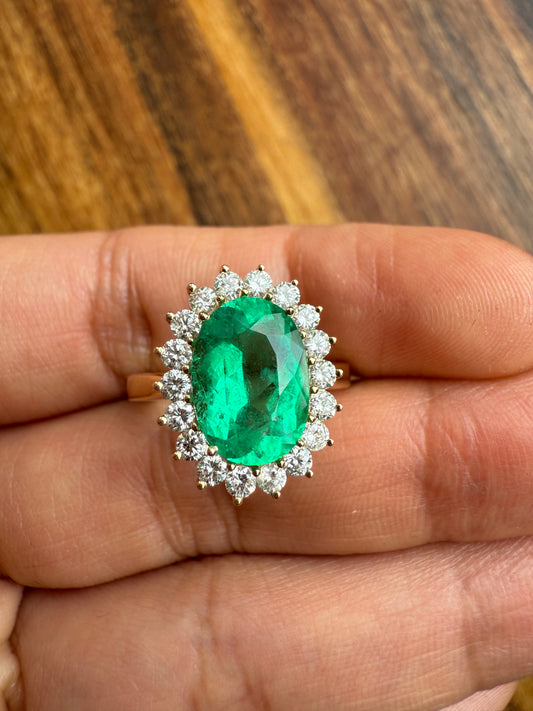 Oval emerald ring with diamonds